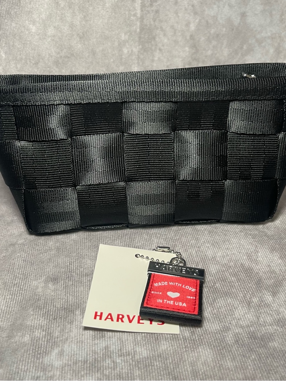 Harvey’s seatbelt black triangle makeup case